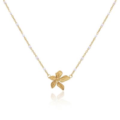 Collier fleur dore acier inoxydable 01